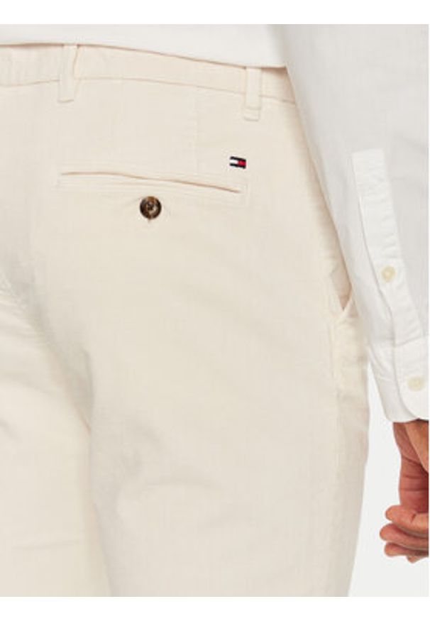 TOMMY HILFIGER - Tommy Hilfiger Spodnie materiałowe MW0MW32932 Écru Regular Fit. Materiał: sztruks