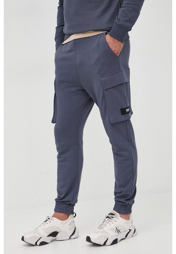 G-Star RAW - G-Star Raw spodnie dresowe D21529.A613 męskie kolor granatowy gładkie. Kolor: niebieski. Materiał: dresówka. Wzór: gładki