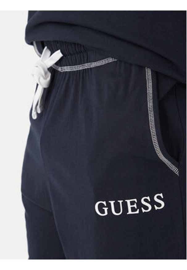 Guess Piżama U6GX03 KCAM1 Granatowy Regular Fit. Kolor: niebieski. Materiał: bawełna