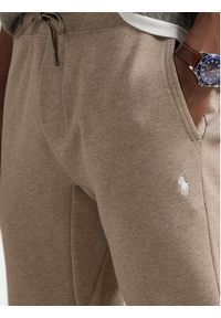Polo Ralph Lauren Spodnie dresowe 710881518046 Beżowy Regular Fit. Kolor: beżowy. Materiał: bawełna