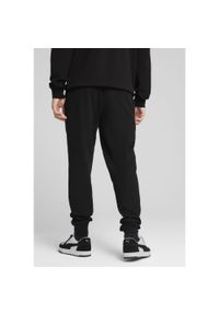 Puma - Męskie spodnie Essentials Elevated PUMA Black. Kolor: czarny
