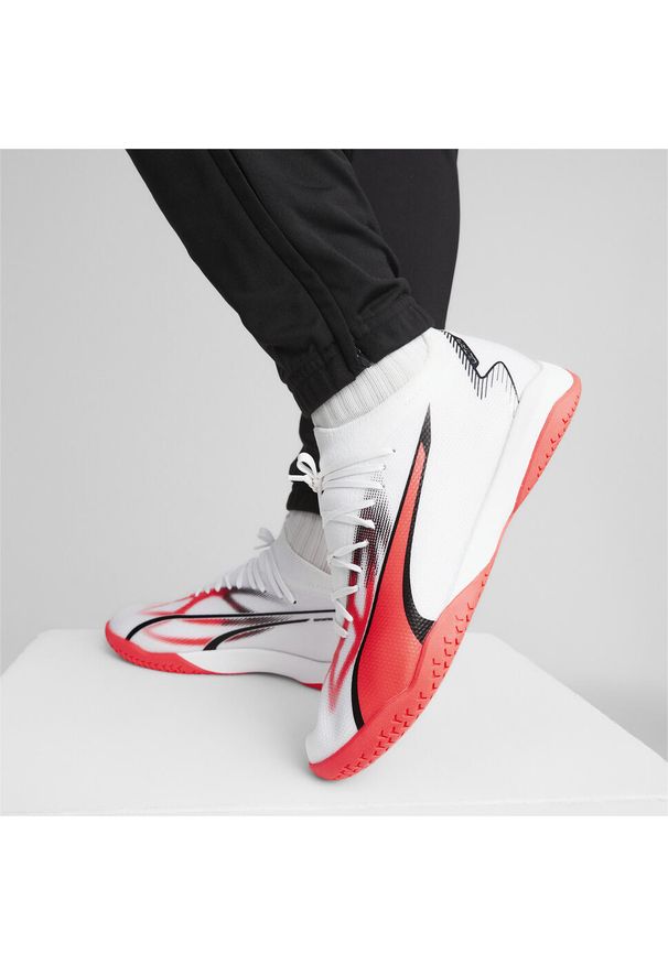Buty piłkarskie męskie Puma Ultra Match It. Kolor: czerwony, czarny, wielokolorowy. Sport: piłka nożna