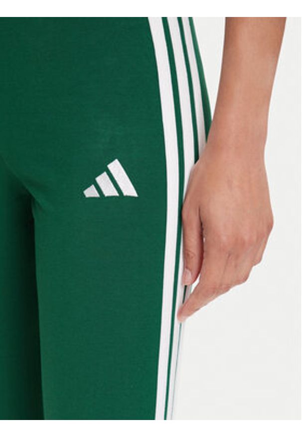 Adidas - adidas Legginsy Essentials 3-Stripes KB7663 Zielony Slim Fit. Kolor: zielony. Materiał: bawełna