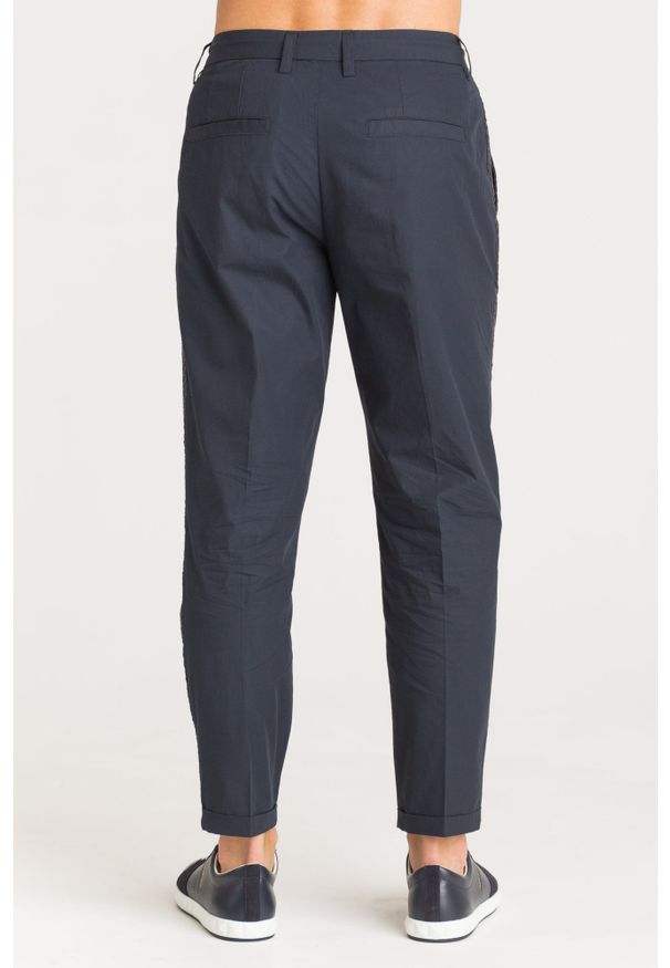 Spodnie dresowe Armani Exchange w kolorowe wzory