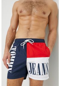 Tommy Jeans szorty kąpielowe kolor granatowy. Kolor: niebieski. Materiał: tkanina, poliester. Wzór: nadruk