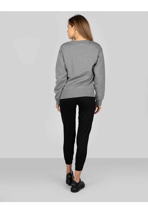Trussardi Jeans - Trussardi Sport Spodnie | 44P00019 | Kobieta | Czarny. Okazja: na co dzień. Kolor: czarny. Materiał: bawełna. Wzór: aplikacja. Styl: sportowy