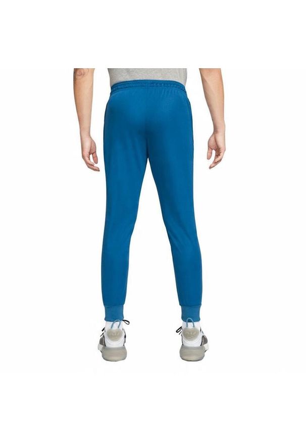 Nike - Męskie Spodnie Dresowe FC Libero DriFIT. Kolor: niebieski. Materiał: dresówka