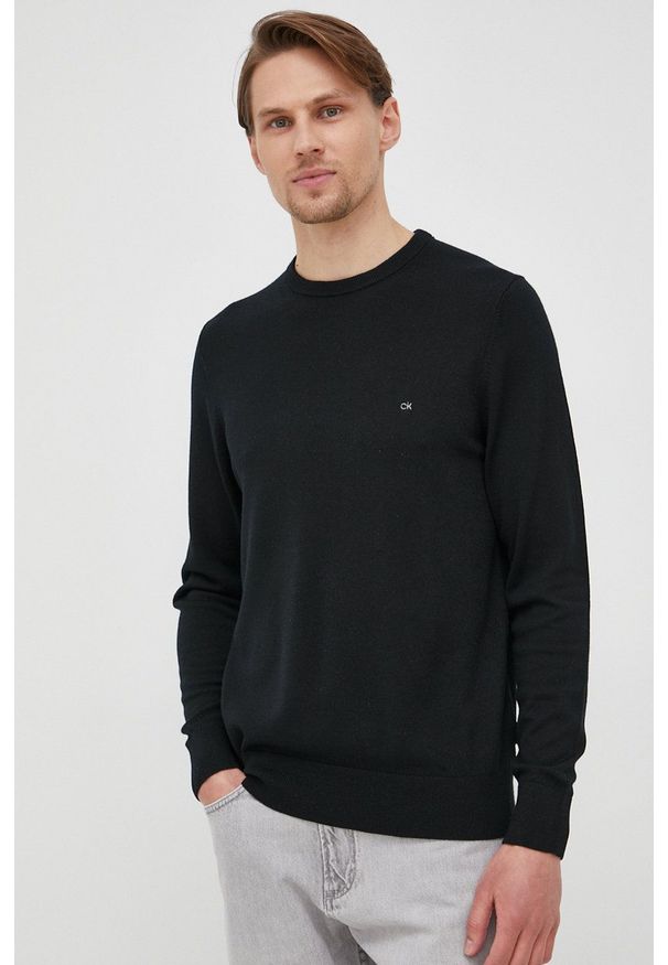 Calvin Klein - Sweter wełniany. Kolor: czarny. Materiał: wełna