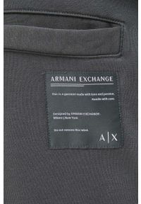 Armani Exchange spodnie dresowe męskie kolor zielony wzorzyste. Kolor: zielony. Materiał: dresówka