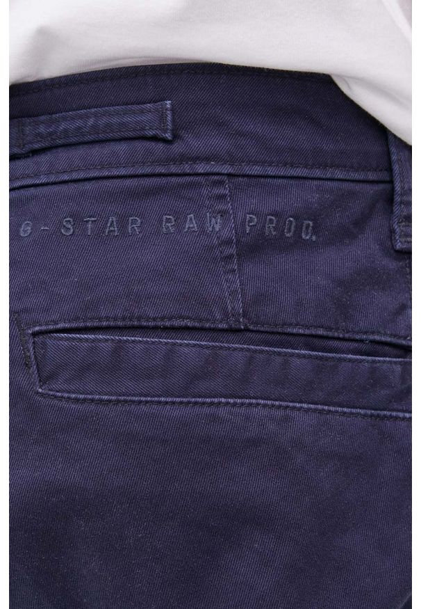 G-Star RAW - G-Star Raw spodnie męskie kolor granatowy w fasonie chinos. Kolor: niebieski. Materiał: tkanina