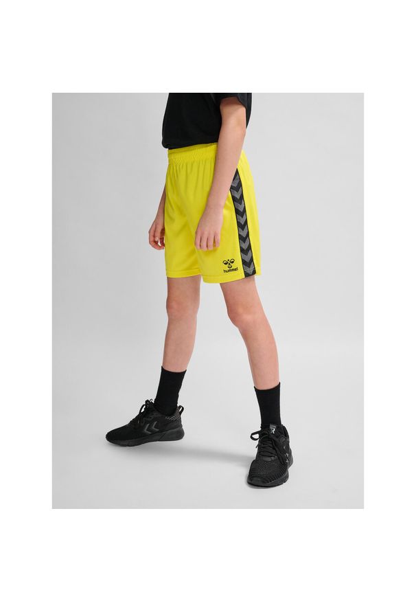 Szorty dla dzieci Hummel autentyczne Pl. Kolor: żółty. Długość: krótkie. Styl: sportowy, młodzieżowy