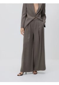 Reserved - Spodnie z wiskozą - beżowy. Kolor: beżowy. Materiał: wiskoza #1