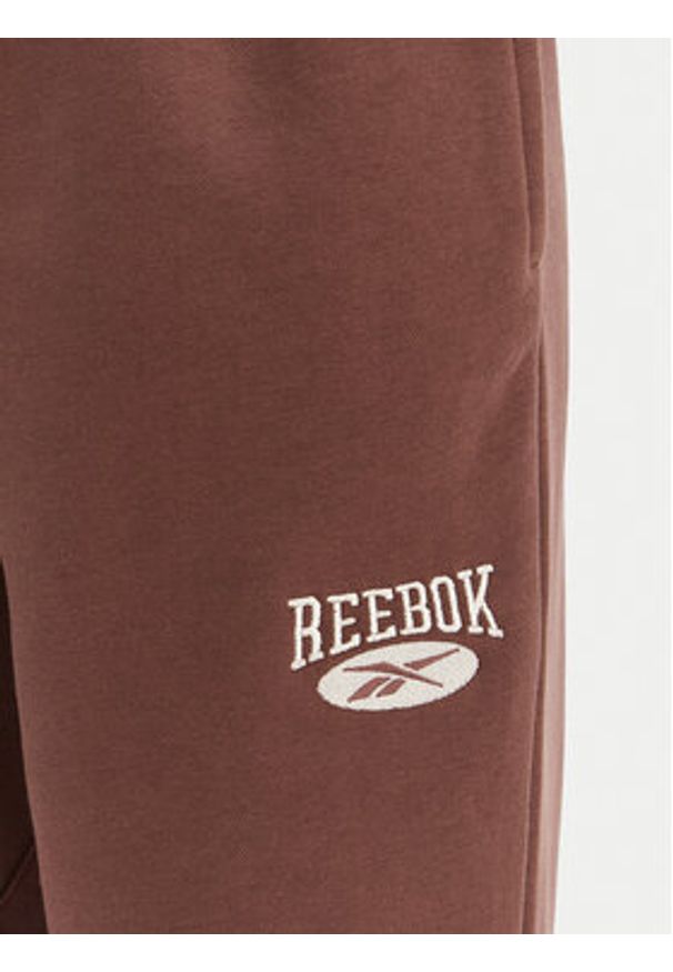 Reebok Spodnie dresowe Cl Ae Pant 100202799 Brązowy Regular Fit. Kolor: brązowy. Materiał: bawełna