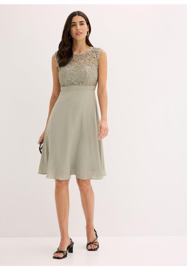 bonprix - Sukienka koronką. Kolor: zielony. Materiał: koronka. Wzór: koronka. Styl: elegancki. Długość: mini