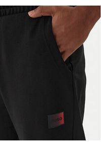 Hugo - HUGO Spodnie dresowe Danopan 50553146 Czarny Relaxed Fit. Kolor: czarny. Materiał: bawełna #4