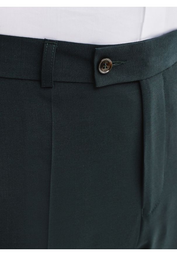 Pako Lorente - PAKO LORENTE – Wełniane spodnie garniturowe w kolorze zielonym. Okazja: na spotkanie biznesowe. Kolor: zielony. Materiał: wełna. Styl: elegancki, biznesowy