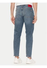 Hugo - HUGO Jeansy 50537705 Niebieski Tapered Fit. Kolor: niebieski