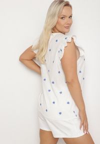 Born2be - Biała Bluzka z Bawełny Ozdobiona Falbankami i Koniczynkami Dolassea. Okazja: na spacer, na co dzień. Typ kołnierza: kołnierz z falbankami. Kolor: biały. Materiał: bawełna. Długość rękawa: krótki rękaw. Długość: krótkie. Wzór: aplikacja. Styl: casual, elegancki #5