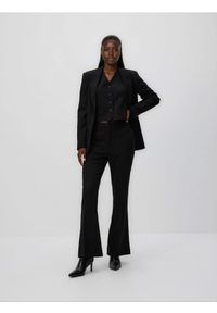 Reserved - Spodnie flare w paski - czarny. Kolor: czarny. Materiał: wiskoza, tkanina. Wzór: paski