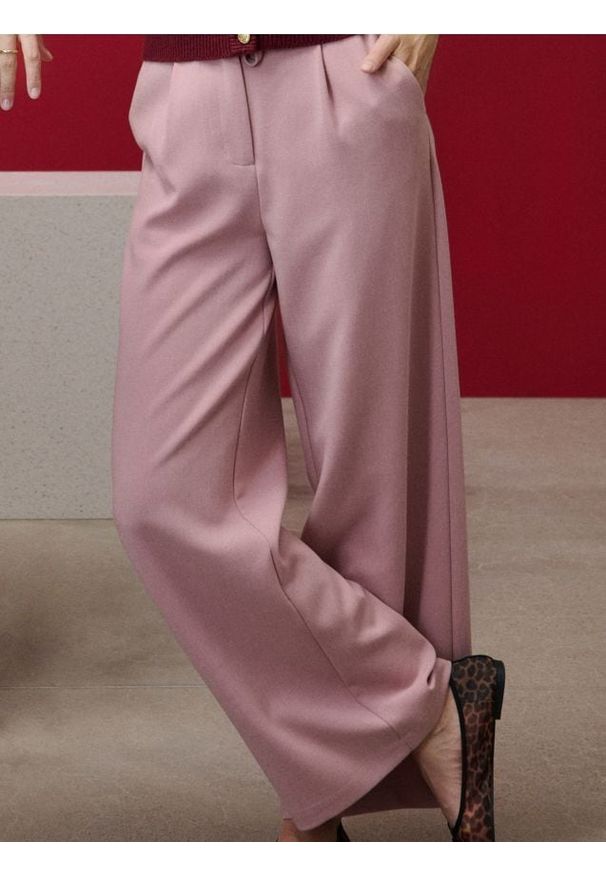 Sinsay - Spodnie wide leg - różowy. Kolor: różowy