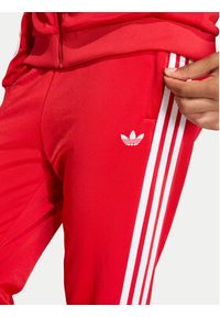 Adidas - adidas Spodnie dresowe adicolor SST KE2861 Czerwony Regular Fit. Kolor: czerwony. Materiał: syntetyk #4