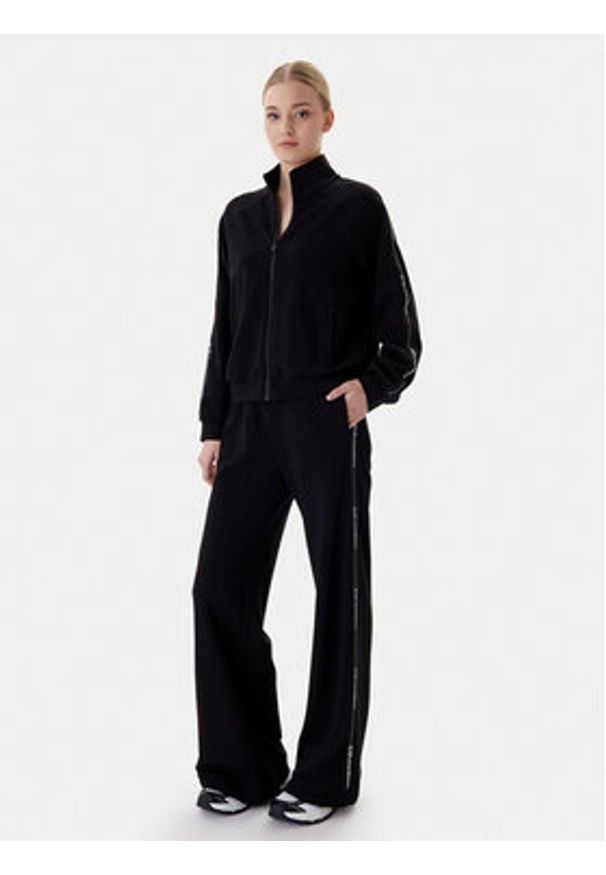 EA7 Emporio Armani Spodnie dresowe 7W000961 AF12501 UC001 Czarny Flared Fit. Kolor: czarny. Materiał: syntetyk