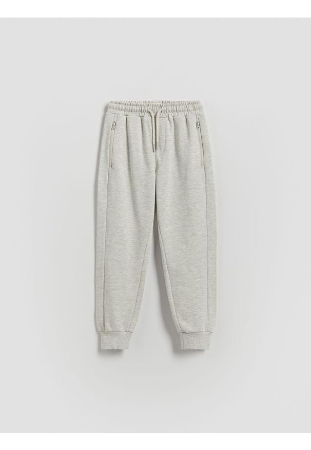 Reserved - Bawełniane joggery - beżowy. Kolor: beżowy. Materiał: bawełna