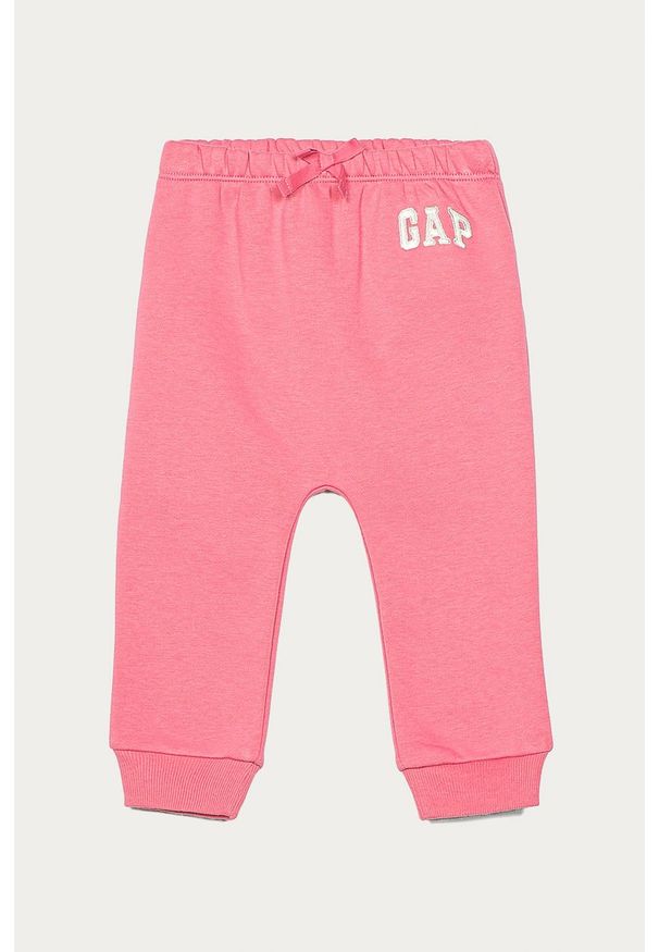 GAP - Spodnie dziecięce 50-74 cm. Kolor: różowy. Materiał: bawełna, poliester, dzianina