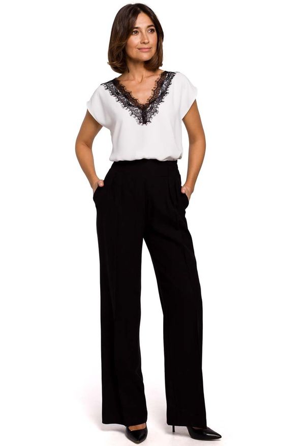 MOE - Czarne Stylowe Spodnie na Gumie z Szerokimi Nogawkami.. Kolor: czarny. Materiał: guma. Styl: elegancki