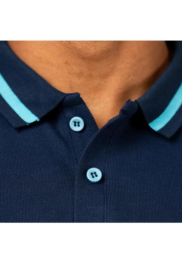 MANCHESTER CITY - Polo męskie Manchester City. Typ kołnierza: polo. Kolor: niebieski. Sport: piłka nożna