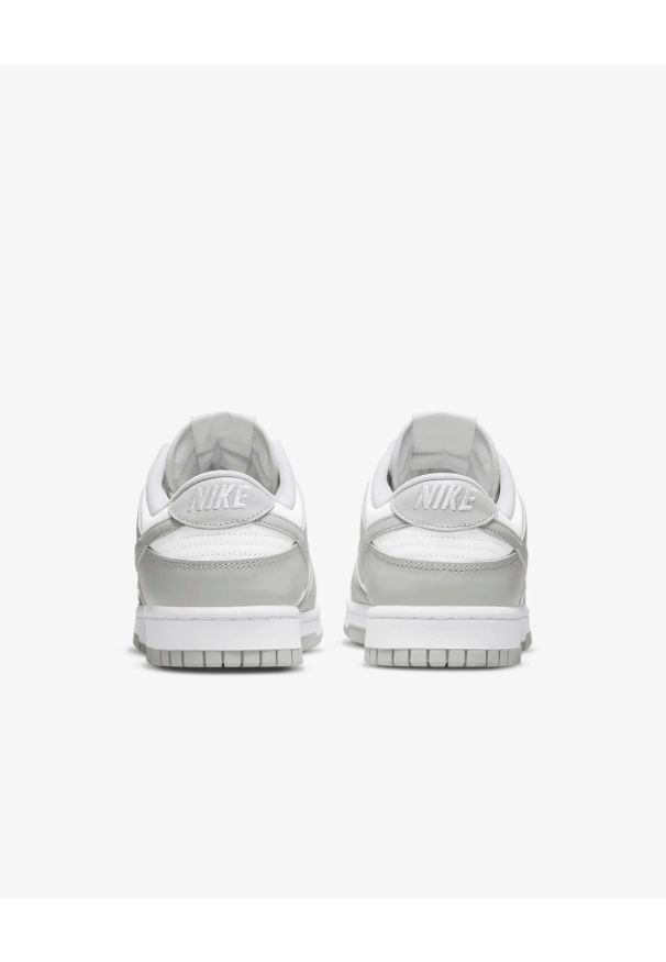 Nike Dunk Low Retro Sneakersy męskie. Okazja: na co dzień. Kolor: biały. Materiał: guma, skóra. Szerokość cholewki: normalna. Sezon: lato