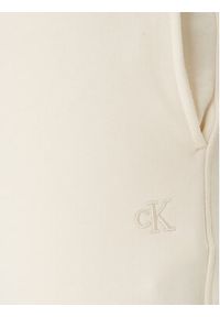 Calvin Klein Jeans Spodnie dresowe Monogram LV047F210G Beżowy Regular Fit. Kolor: beżowy. Materiał: bawełna #5