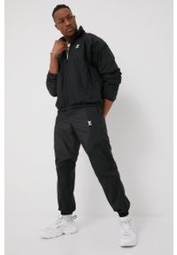 adidas Originals kurtka męska kolor czarny przejściowa. Okazja: na co dzień. Kolor: czarny. Materiał: materiał. Długość rękawa: raglanowy rękaw. Styl: casual
