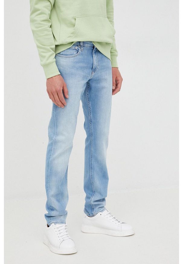 Calvin Klein Jeans jeansy J30J320470.PPYY męskie. Kolor: niebieski