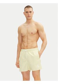 Calvin Klein Swimwear Szorty kąpielowe KM0KM01101 Beżowy Regular Fit. Kolor: beżowy. Materiał: syntetyk