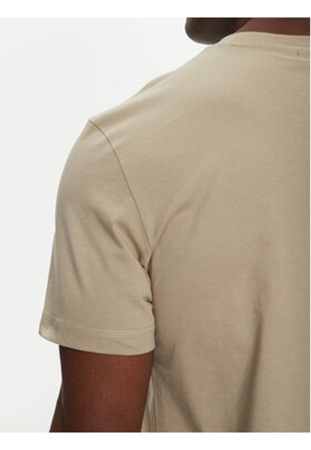 Calvin Klein Jeans T-Shirt Monologo J30J325649 Beżowy Regular Fit. Kolor: beżowy. Materiał: bawełna