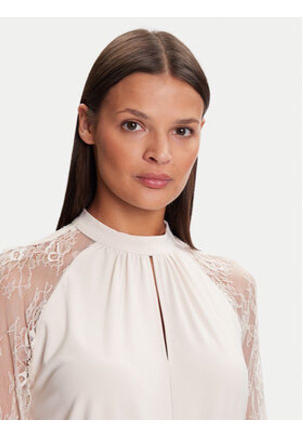 Vero Moda Bluzka Milla 10334620 Beżowy Loose Fit. Kolor: beżowy. Materiał: syntetyk