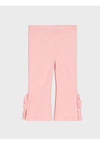 Sinsay - Spodnie z rozcięciami przy nogawkach - różowy. Kolor: różowy #1