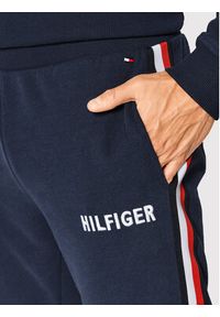 TOMMY HILFIGER - Tommy Hilfiger Spodnie dresowe UM0UM02441 Granatowy Regular Fit. Kolor: niebieski. Materiał: bawełna #3
