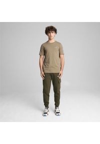 Puma - Męskie bojówki Essentials PUMA Dark Olive Green. Kolor: zielony. Długość: długie