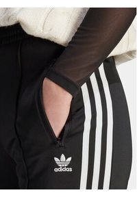 Adidas - adidas Spodnie dresowe adicolor Classics Firebird IL8763 Czarny Regular Fit. Kolor: czarny. Materiał: syntetyk #2