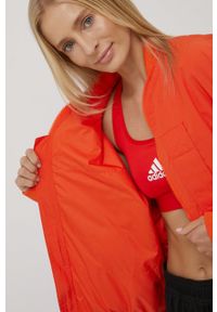 Adidas by Stella McCartney - adidas by Stella McCartney wiatrówka H59970 kolor pomarańczowy przejściowa oversize. Typ kołnierza: kołnierzyk stójkowy. Kolor: pomarańczowy. Materiał: tkanina, materiał. Wzór: ze splotem #2