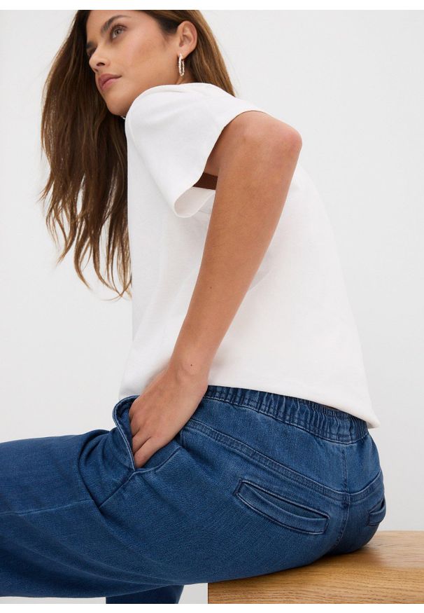 bonprix - Dżinsy ze stretchem wide leg, mid waist. Kolor: niebieski
