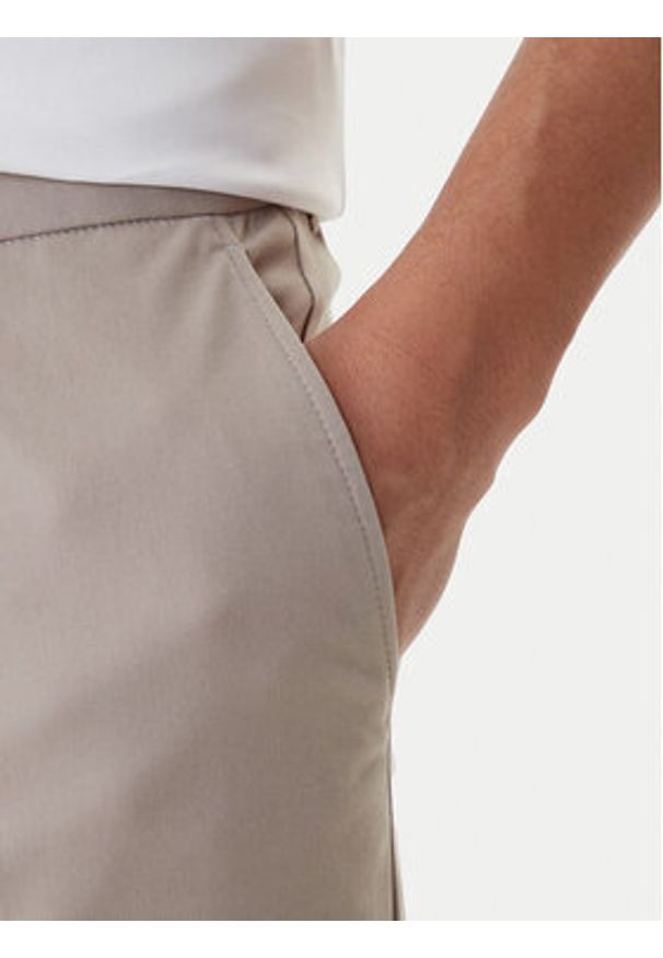 BOSS Spodnie materiałowe C-Genius 50555035 Beżowy Slim Fit. Kolor: beżowy. Materiał: bawełna