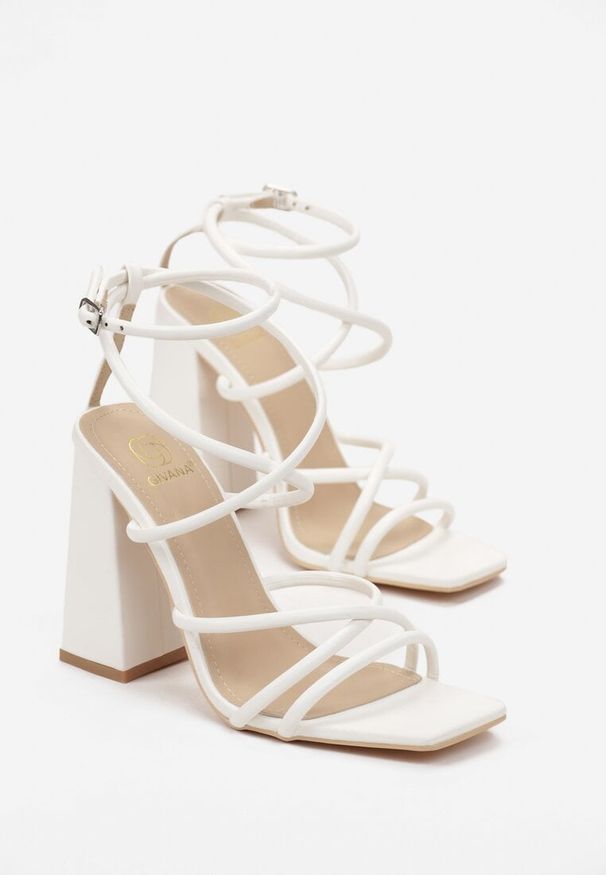 Renee - Białe Sandały na Wysokim Słupku z Cienkimi Paskami Tajo. Zapięcie: pasek. Kolor: biały. Obcas: na słupku. Wysokość obcasa: średni