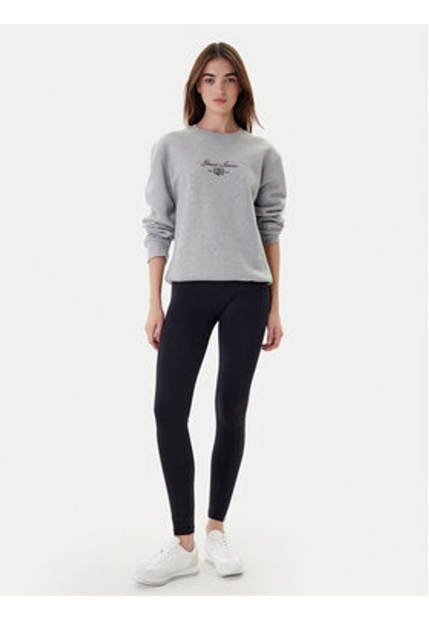 Calvin Klein Legginsy 701233681 Czarny Slim Fit. Kolor: czarny. Materiał: syntetyk