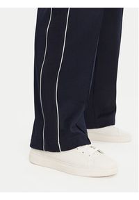 Lacoste Spodnie dresowe XF7260 Granatowy Relaxed Fit. Kolor: niebieski. Materiał: syntetyk, bawełna #4