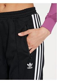 Adidas - adidas Spodnie dresowe Beckenbauer IW3171 Czarny Regular Fit. Kolor: czarny. Materiał: syntetyk, bawełna #4