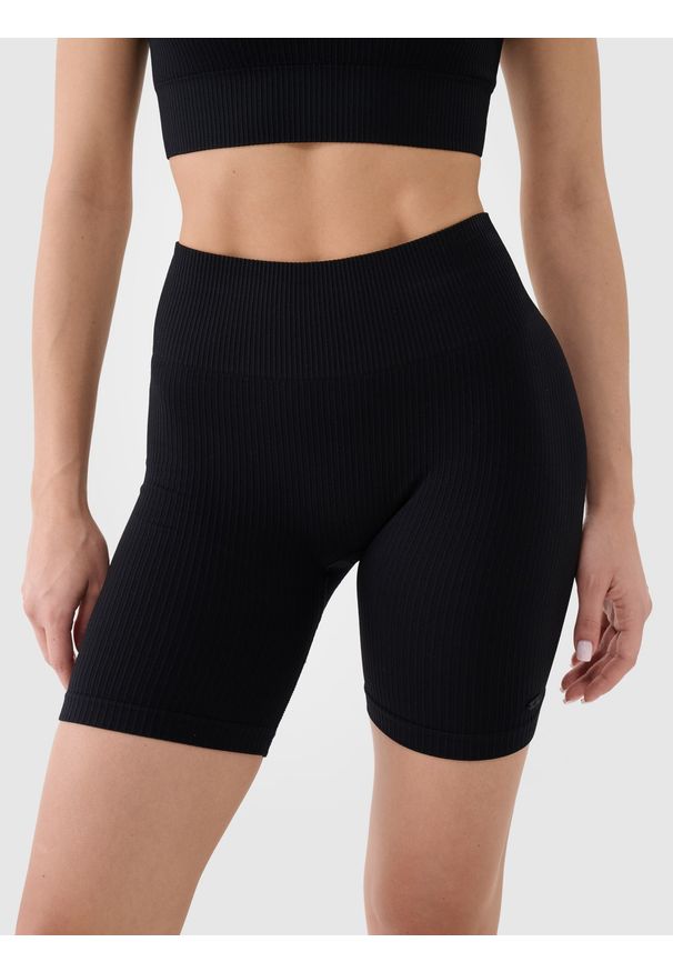 4f - 4F Legginsy kolarki bezszwowe treningowe damskie - czarne M/L. Stan: podwyższony. Kolor: czarny. Materiał: dzianina, materiał, syntetyk, włókno, elastan. Długość: krótkie. Wzór: jednolity. Sport: fitness