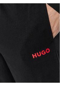 Hugo Spodnie dresowe Linked 50505151 Czarny Regular Fit. Kolor: czarny. Materiał: bawełna